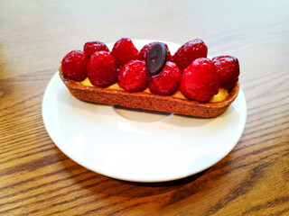 delicious Raspberry tartlet ready to eat