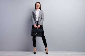 Full body photo of attractive business lady beaming smiling worker young promoted chief hold...
