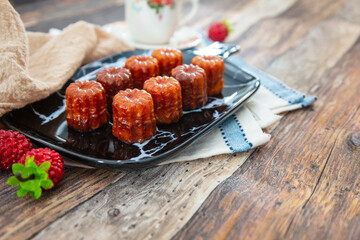 Canele is a small French pastry with rum and vanilla
