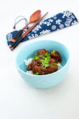 Asian style caramel pork with rice and vegetable