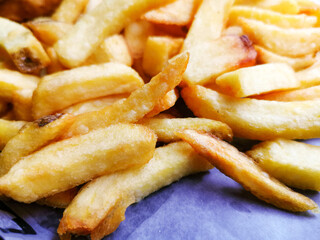Golden French fries potatoes ready to be eaten