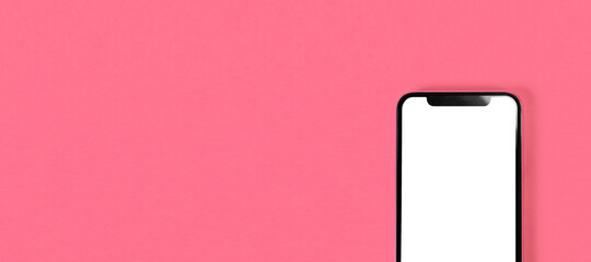 Blank smartphone on pink background.  Photo.  ピンク背景の上のスマホのブランク素材。写真
