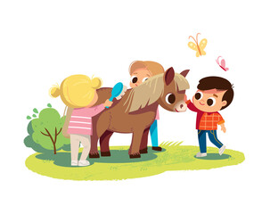 Little boy feed the pony. Girl brushing pony with comb. Kids with animals. Pets care. Summer background.