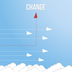 Think differently concept. Red airplane changing direction. New idea, change, trend, courage, creative solution, innovation and unique way concept.	