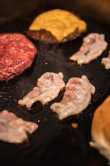 Close-up of beef cutlet, for burger, fried in a pan, grill, cutlet cuddle culinary, cooking process