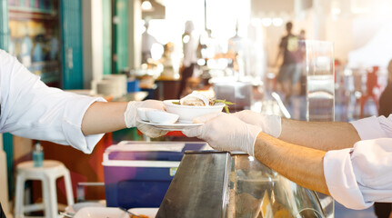 New Normal Restaurant table send to customer table with clean gloves
