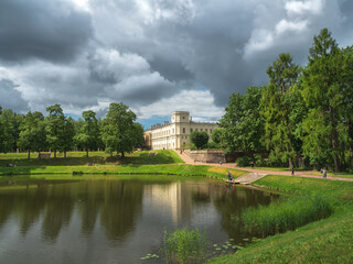 Fototapeta na wymiar Bright summer landscape of the Park with a Large Gatchina Palace. Russia