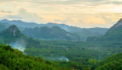 Views of mountains and forests, where mountains, rocks and trees alternately beautifully look green.