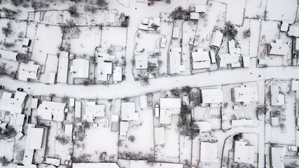 Aerial view of houses in poor areas of Ukraine in a village in winter
