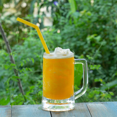 glass of fresh orange juice smoothie