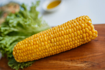 boiled corn on the table close-up.