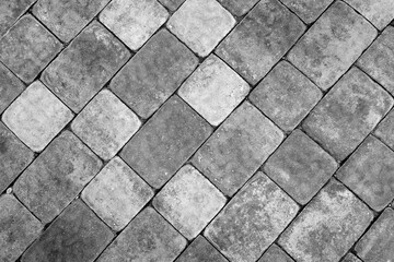 Stone pavement texture in black and white.