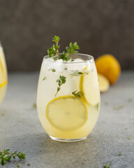 Alcoholic cocktail with rum, lemon juice and ice. Summer cocktail Lemon-Thyme Daiquiri. Selective...