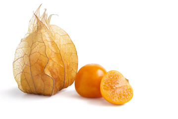 Ripe gooseberry, physalis cut in half, showing seeds and calyx isolated on white