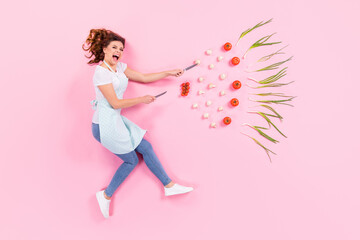 Top above high angle view full size profile side photo crazy housewife girl fight fresh ecological vegetables prepare recipe hold knife flatlay scream isolated pastel color background