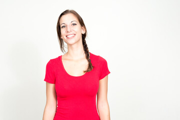 Fototapeta premium Portrait of happy young beautiful woman with brown hair smiling