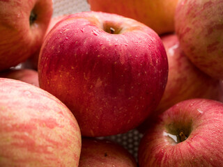Fototapeta na wymiar Close up of fresh red apples in the basket.