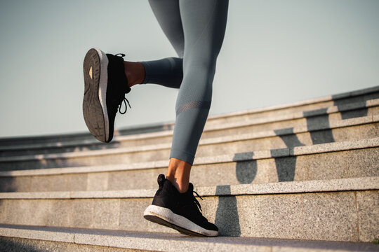 Legs of a fitness woman running