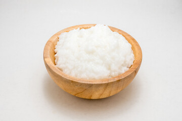 rice gruel or rice porridge in a wooden bowl.