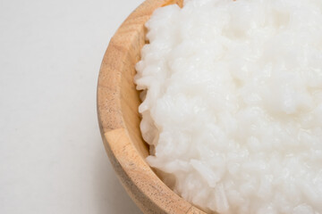 Fototapeta na wymiar rice gruel or rice porridge in a wooden bowl.
