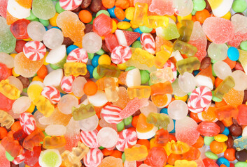 Colorful fruit candies and jellies background