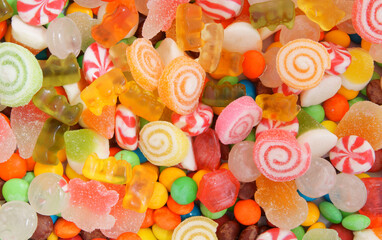 Fototapeta na wymiar Colorful fruit candies and jellies background