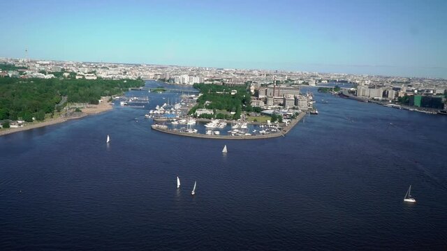 SAINT-PETERSBURG, RUSSIA JUNE 21 2020: Flying helicopter over marine yacht port