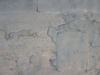 Damaged road surface. Broken asphalt.