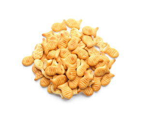 Delicious crispy goldfish crackers on white background, top view
