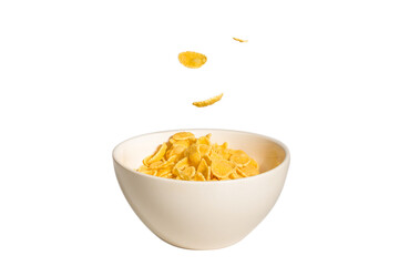 Corn flakes falling to the white bowl. Motion.