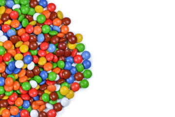 Obraz premium Chocolate multicolored candies isolated on white