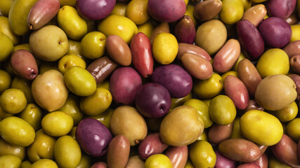 Tasty mix olives background.