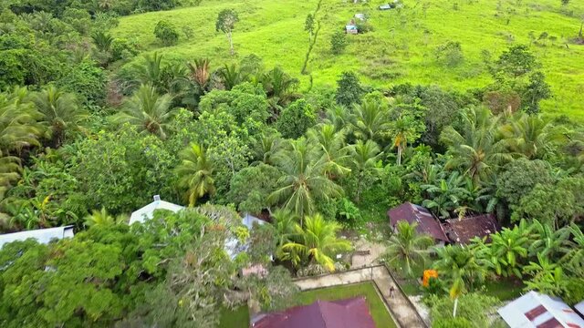 Flight backward over the Christian village of Tungu in the Aru islands archipelago in Indonesia, between Papua and Australia.