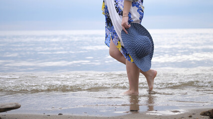 Happy Blond Beautiful Girl Relaxing On Vacation Beach. close up of her feet