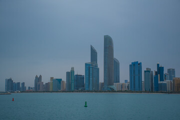 Abu Dhabi skyline from the Marina coast on a cloudy rainy day
