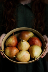 Fresh harvest of pears in a plate
