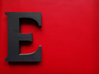 red background with letter e
