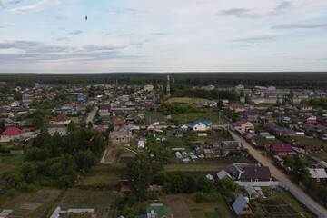 View of a small town at sunset on a June day
