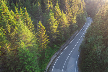 Aerial landscape of mountain winding road, in Transylvania