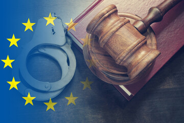 Wooden judge gavel, handcuffs and legal book, collage with european union flag