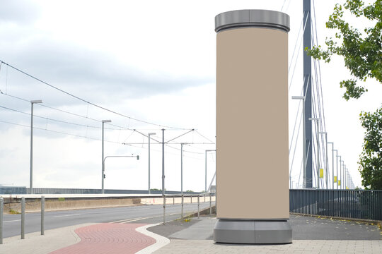 blank advertising pillar,public advertising display, outside setting, free copy space