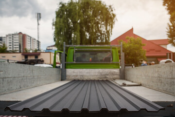 roof metal tiles are in truck and prepare to be delivered