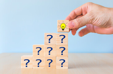 Cubes dice with light bulb and question mark