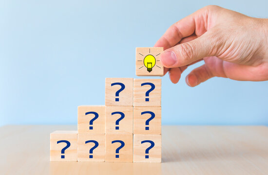 Cubes dice with light bulb and question mark