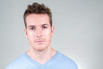 Fototapeta premium Face of handsome man looking at camera