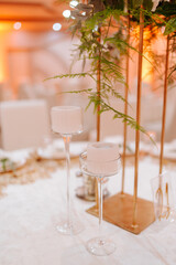 Beautiful romantic candles on the table. Decoration for the celebration