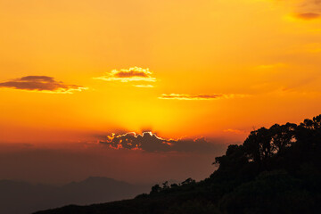 The peak of mountain with beautiful sunset at point view. Good day moment.