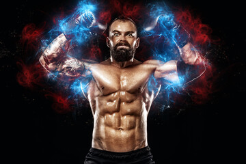 Fototapeta na wymiar Athlete bodybuilder in blue energy lights. Boxer with tattoo in boxing gloves celebrating flawless victory. Sport concept isolated on black background.