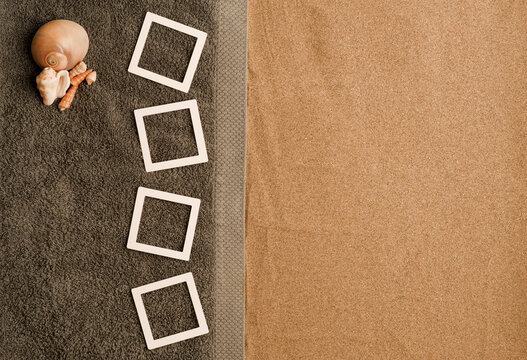 concept photo beach memories collage photo frames mockup on gray towel with shells. sand. Top view.
space for text