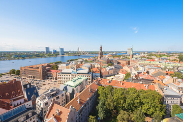 Fototapeta na wymiar Landscape. Panoramic view of Riga old city in summer, under blue sunny sky